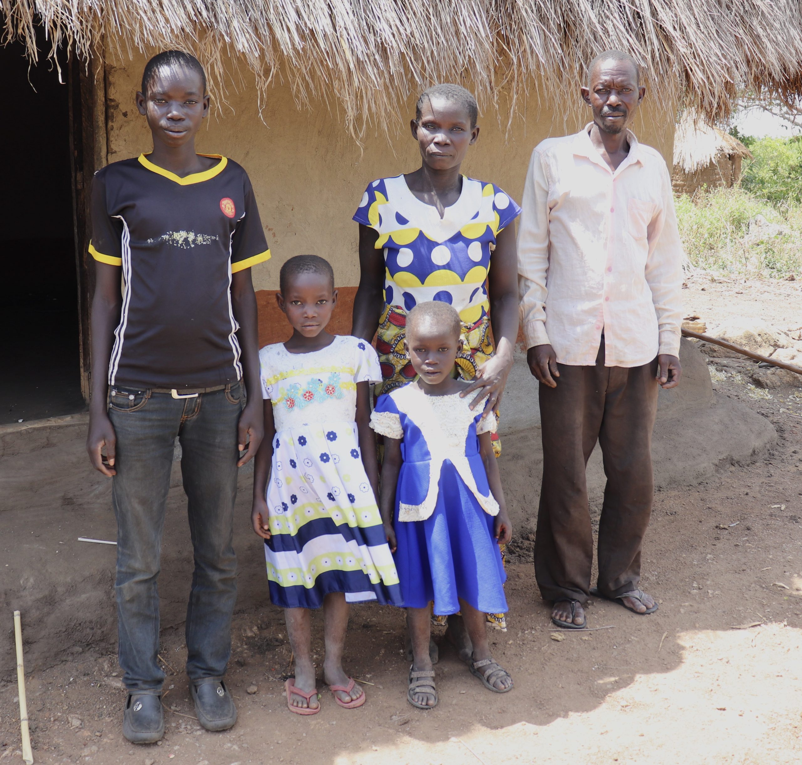Profile 2 – Ngamita (second right), with her husband (right) and three of their children